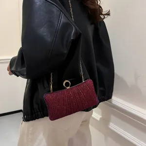 Elegant rhinestone evening bag with chain, sparkling red clutch for women, stylish party purse.