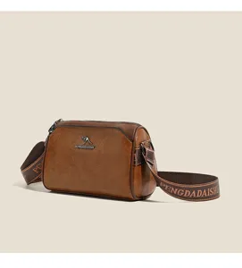 Vintage brown shoulder bag for women, retro style crossbody handbag with wide web strap.