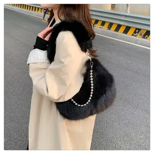 Faux fur shoulder bag with metal ball chain, chic fluffy underarm bag for women autumn winter style.