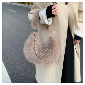 Fluffy faux fur underarm bag detail, stylish winter shoulder handbag with metal ball chain strap.