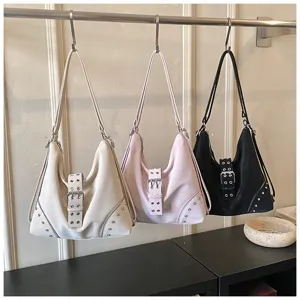 Trendy shoulder underarm bag with metal buckles and studs, stylish daily crossbody tote for women.