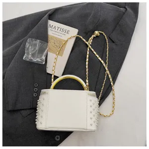 Chic white pearl box handbag with metal handle and chain strap for women spring fashion.