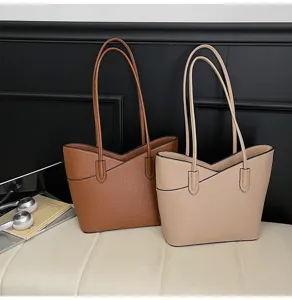 Stylish dual-color leather tote bags detail shot, premium commuting handbag with large capacity.