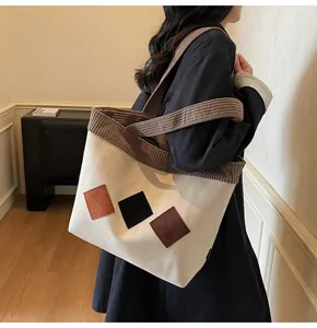 Casual canvas corduroy tote bag with geometric patches, large capacity, stylish everyday.