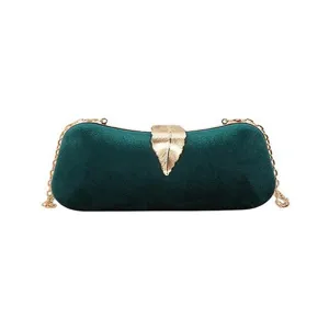 Elegant dark green velvet evening clutch bag featuring a gold leaf clasp and chain strap.
