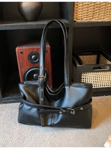 Borsa shopper nera in ecopelle con fibbia, grande borsa a spalla elegante da donna.