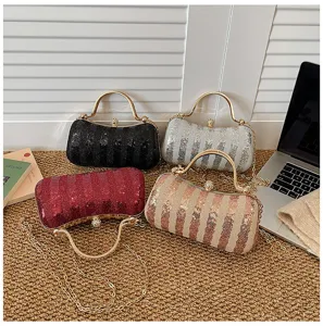 Shiny sequin evening clutch bag with metal top handle and chain strap for women party.