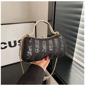 Elegant black sequin evening bag with gold metal handle and chain strap for women parties.
