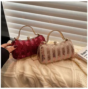 Exquisite sequin evening clutch bag with metal handle and chain strap for women detail view.