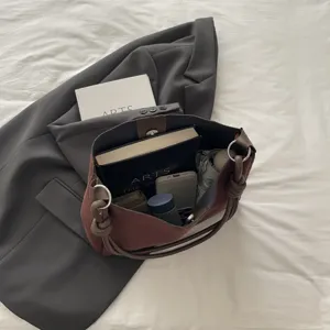 Winter new large capacity suede tote bag, minimalist shoulder handbag with knot handle details.
