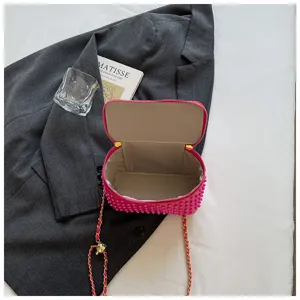 Trendy hot pink beaded vanity box bag with chain strap, stylish women's crossbody shoulder bag.
