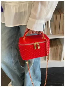 Red pearl studded vanity box bag with gold chain strap, chic shoulder crossbody bag for women.