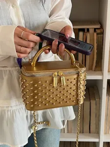 Gold studded vanity box handbag with metal handle and chain strap for women stylish daily wear