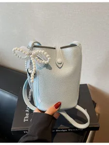 Sac bandoulière de téléphone portable décontracté style coréen avec beau nœud de perles.