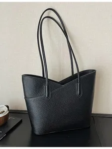 Black textured leather tote bag for women, large capacity shoulder bag for daily commuting.
