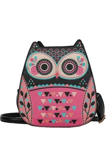 Cute owl shaped crossbody bag for women, stylish black and pink PU leather shoulder handbag.