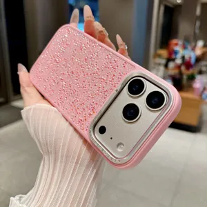 Pink glitter phone case detail showing sparkling rhinestones and camera protector frame.