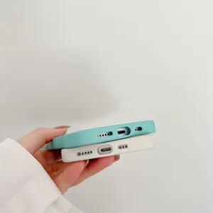 Detail view of liquid silicone wavy phone case showing precise bottom cutouts and dual colors.