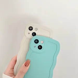 Detail view of wavy silicone phone case, soft touch texture and precise camera cutouts.