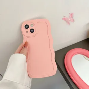Close-up detail shot of the pink liquid silicone wavy phone case showcasing its sleek texture.
