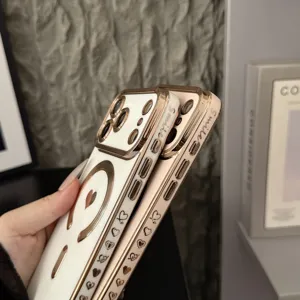 Electroplated magnetic phone case with cute heart pattern and metallic frame detail closeup.