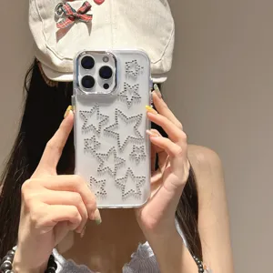 Clear soft phone case detail featuring sparkling rhinestone star designs and precise cutouts.