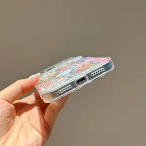 Clear phone case detail view, featuring colorful floral and heart relief decorations for iPhone.