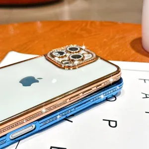 Luxury rhinestone electroplated phone case with camera protector for iPhone, elegant style.