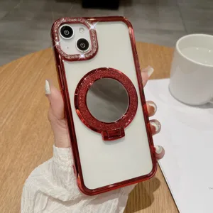 Κόκκινη θήκη iPhone με στραστς, βάση δακτυλίου με καθρέφτη και προστασία φακού κάμερας.