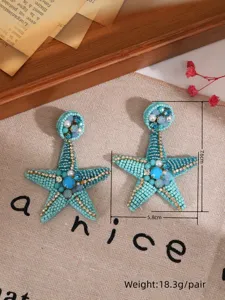 Boucles d'oreilles étoile de mer perlées à la main, bijoux de vacances plage style océan.