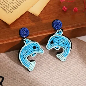 Boucles d'oreilles dauphin perles faits main femmes, style plage océan jolies boucles pendantes.
