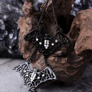 Gothic bat dangle earrings with sparkling clear rhinestones, dark black metal punk style jewelry.
