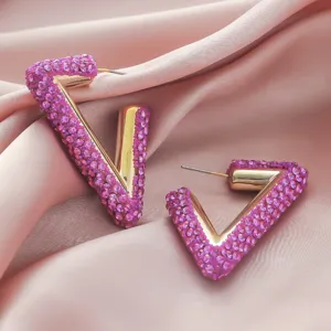 Elegant pink crystal V-shaped hoop earrings for women, stylish geometric daily jewelry.