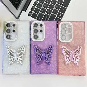 Luxury bling shell phone case with hollow butterfly stand for Samsung Galaxy, chic and stylish.