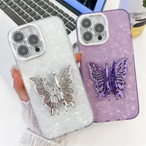Glitter marble phone case with 3D metal butterfly stand, elegant protection for iPhone devices.