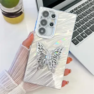 Detail shot of a holographic wave phone case with silver butterfly stand and camera protection.