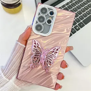 Close-up detail of the pink wavy phone case featuring a shiny butterfly stand and camera guard.