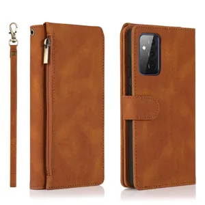 Brown leather wallet phone case detail, card slots, zipper pocket and detachable strap.