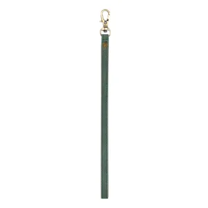 Green leather wrist strap detail, bronze clasp, premium accessory lanyard for cases and wallets.