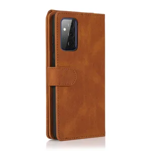 Detail shot of brown leather flip wallet phone case with card slots and secure magnetic closure.