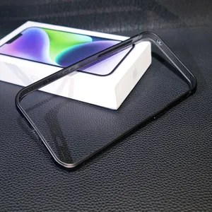 Detailed close-up of black metal phone bumper frame, slim profile, premium texture and precise fit.