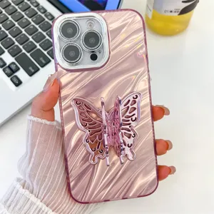 Pink wavy iPhone case with butterfly stand and camera protector, stylish phone cover for women.
