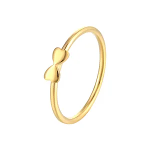 Minimalist gold-plated thin band ring featuring a delicate double heart bow motif for women.