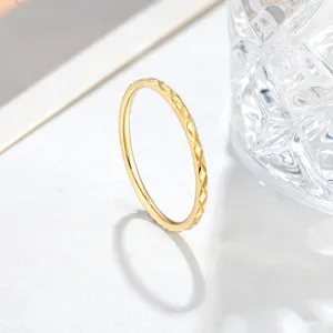 Minimalist gold titanium steel ring with chic faceted diamond pattern for women daily fashion.