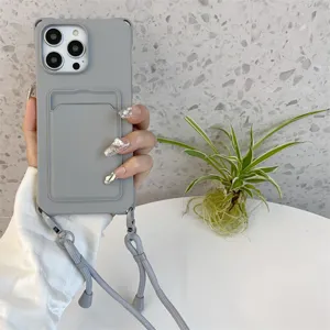 Grijze siliconen telefoonhoesje met kaartvak en lanyard, gedetailleerd overzicht hoeken.