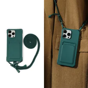 Donkergroene siliconen telefoonhoesje met kaarthouder en lange verstelbare crossbody riem.
