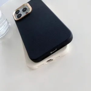 Coque de téléphone similicuir unie minimaliste compatible iPhone, design élégant et protection.