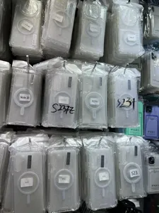 Detailed view of transparent magnetic phone cases hanging in warehouse stock display.