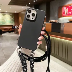 Black crossbody phone case with chain strap detail, designed for Apple iPhone models securely.