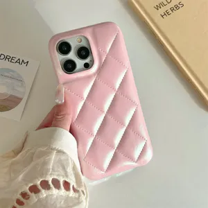 Pink quilted phone case close-up, soft TPU material with stylish diamond pattern design details.